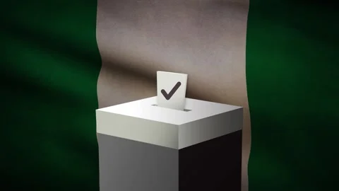 Casting vote into the ballot box during Nigeria election Stock Footage 247146243