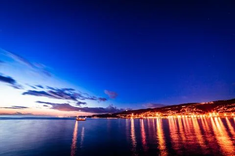 The castle and the lighthouse of Trieste Stock Photos