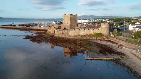 Castle and marina in Carrickfergus near Belfast, Northern Ireland, UK Stock Footage