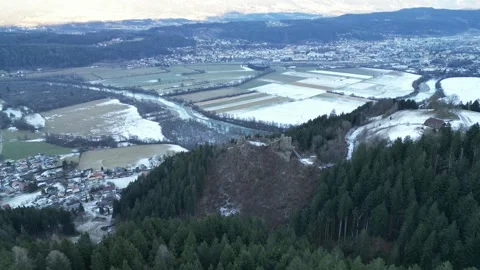Castle in the Austrian Alps Surrounded by Snow-Covered Scenery Stock Footage 288077910