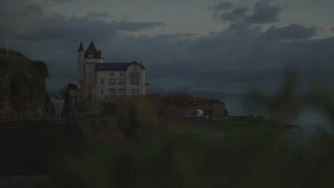 Castle background with sea framed by foliage Видео 346281985