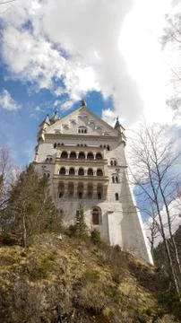 Castle backside facade with cloudy sky Stock Photos