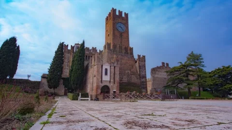 A castle with a clock on the side of a building Stock Footage 156845568