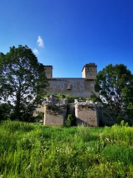 A castle with a clock tower Stock Photos