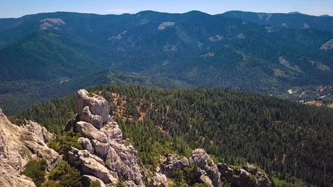 Castle Crags rock formation in Northern California SE descent (Aerial View) Stock Footage