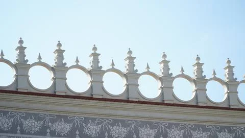Castle decoration elements. Gothic arches against the background of the sky.  Stock Photos