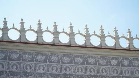 Castle decoration elements. Gothic arches against the background of the sky.  Stock Photos