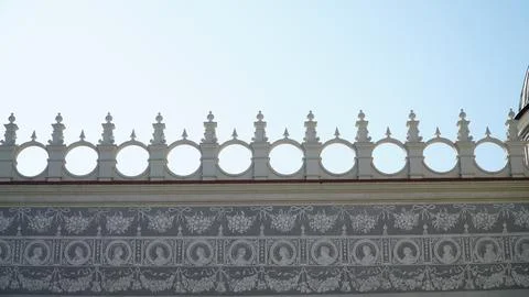 Castle decoration elements. Gothic arches against the background of the sky.  Stock Photos