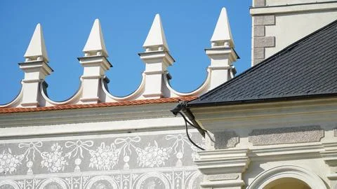 Castle decoration elements. Gothic arches against the background of the sky.  Stock Photos