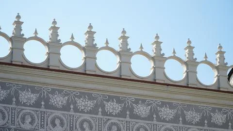 Castle decoration elements. Gothic arches against the background of the sky.  Stock Photos