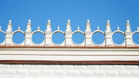 Castle decoration elements. Gothic arches against the background of the sky.  Stock Photos