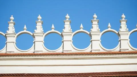 Castle decoration elements. Gothic arches against the background of the sky.  Stock Photos