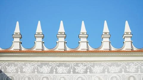 Castle decoration elements. Gothic arches against the background of the sky.  Stock Photos