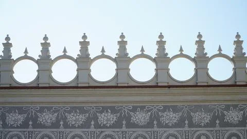 Castle decoration elements. Gothic arches against the background of the sky.  Stock Photos