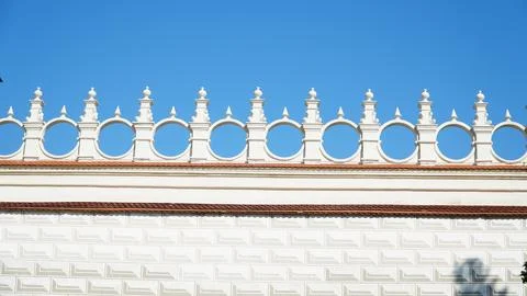 Castle decoration elements. Gothic arches against the background of the sky.  Stock Photos