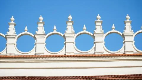 Castle decoration elements. Gothic arches against the background of the sky.  Stock Photos