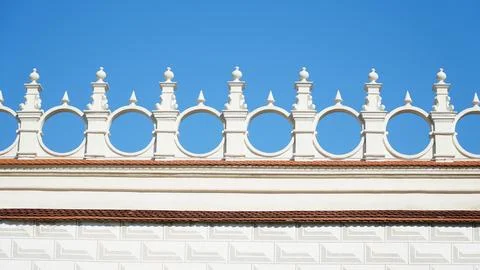 Castle decoration elements. Gothic arches against the background of the sky.  Stock Photos
