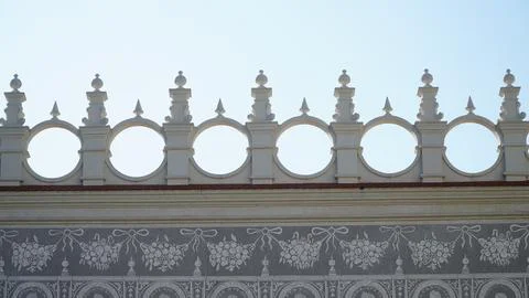 Castle decoration elements. Gothic arches against the background of the sky.  Stock Photos