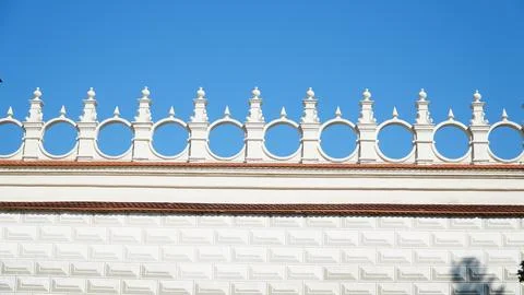 Castle decoration elements. Gothic arches against the background of the sky.  Stock Photos