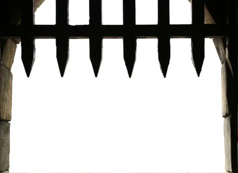 Castle gate with open portcullis Stock Photos