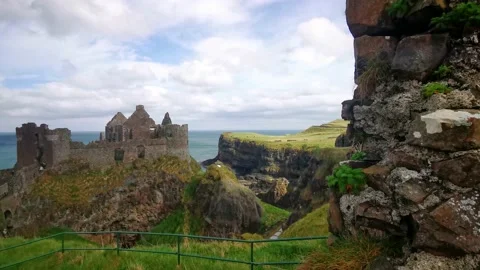Castle on hill with ocean view full down revealing Stock Footage 200772696