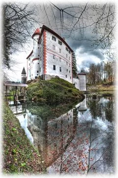 Castle with lake Stock Photos