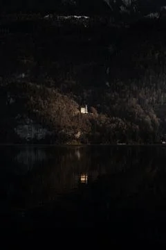 Castle by a lake Stock Photos