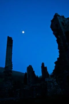 Castle in moon light Stock Photos