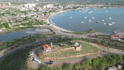 Castle overlooking bay next to the town of Juangriego, Isla margarita, Venezuela Stock Footage 261019684
