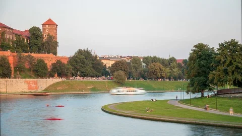 Castle with river and peole walking - 4K Time Lapse Stock Footage 126317176
