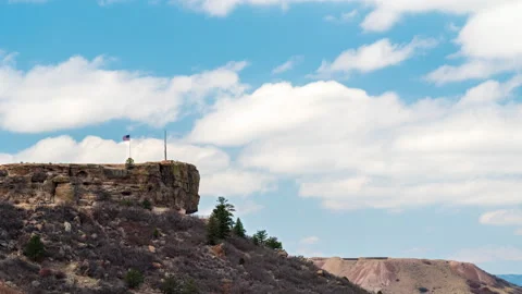 Castle Rock Cloud and Flag Day Timelapse Stock Footage 152339142