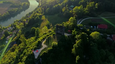 Castle ruins above river valley Stockbeeldmateriaal 335211024