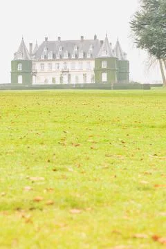 Castle seen from the meadow Stock Photos