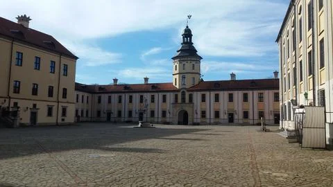 Castle square surrounded by buildings Stock Photos
