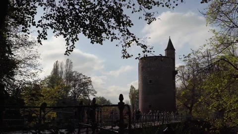 Castle tower next to metal bridge in Bruges Belgium in fall Stock Footage 329052647