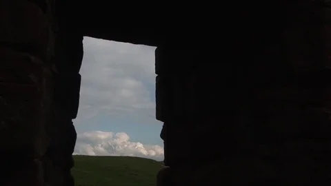 Castle window as clouds move through Видео 70715969