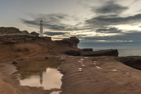 Castlepoint Lighthouse on Rock Stock Photos