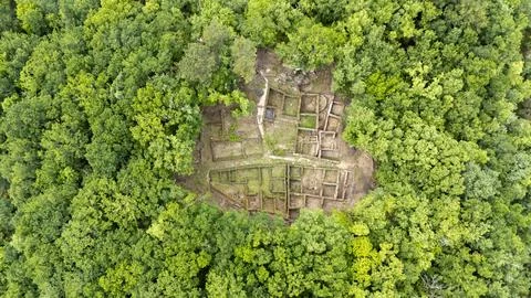 Castro de Armea ancient settlement revealing archeological ruins in forest Stock Photos