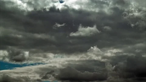 Casts a silver glow on the clouds Stock Footage 93780975