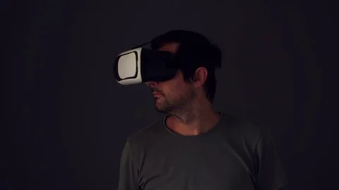 Casual adult man with virtual reality VR headset Stock Footage