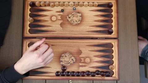 Casual backgammon game with drinks outside Stock Footage 307232032