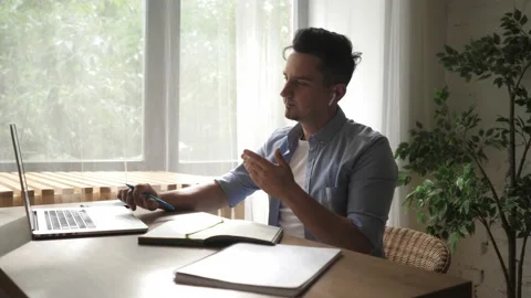 Casual concentrated entrepreneur developing new project while working on laptop Stock Footage 139628229