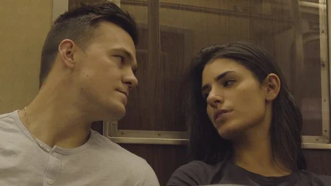 Casual Couple Talks While Riding Subway 4 Stock Footage 95019988