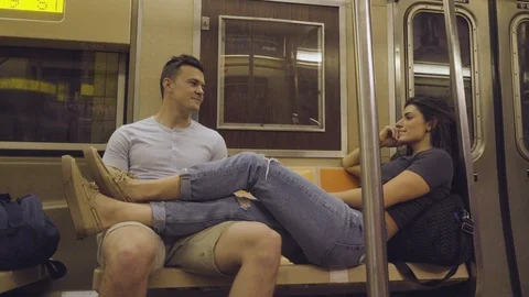 Casual Couple Talks While Riding Subway 6 Stock Footage 95020075