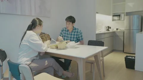 Casual Dining Experience in Modern Kitchen Stock Footage 318916952