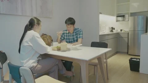 Casual Dining Experience in a Modern Kitchen Stock Footage 318916963