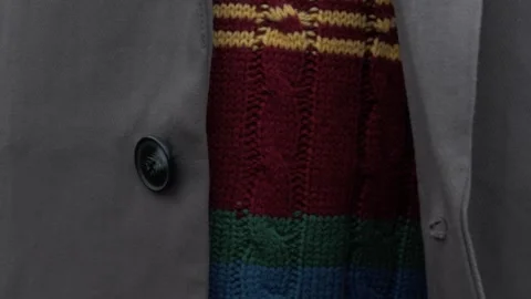 Casual guy buttoning a button on his jacket with his hand close-up Stock Footage 312077580