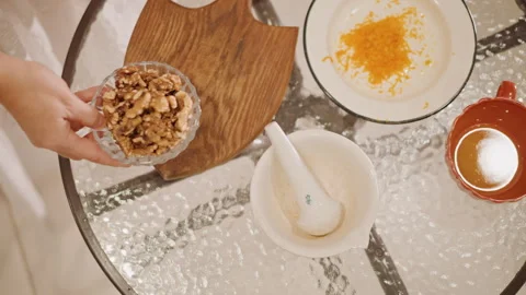 Casual kitchen scene with baker preparing pumpkin dessert. Home kitchen setting Stock-Footage 346396541