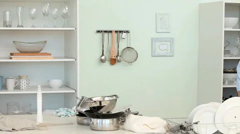 Casual man doing the dishes Stock Footage 1096826