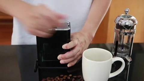 Casual man grinding coffee bean Stock Footage 72113189